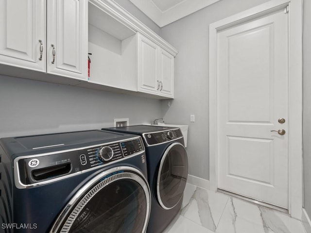 2538 4th Ave NE, Naples, FL 34120 - laundry area featuring a sink, baseboards, washer and dryer, cabinet space, and marble finish floor