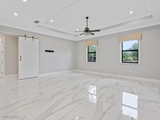 2538 4th Ave NE, Naples, FL 34120 - unfurnished room with a raised ceiling, recessed lighting, and baseboards