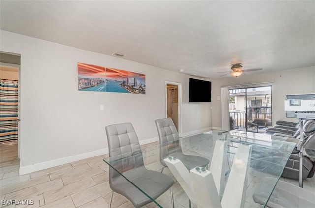 4516 Santa Barbara Blvd Unit 1, Cape Coral, FL 33914 - dining room featuring baseboards, a ceiling fan, and visible vents