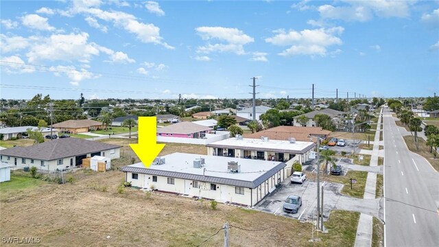 4516 Santa Barbara Blvd Unit 1, Cape Coral, FL 33914 - drone / aerial view featuring a residential view