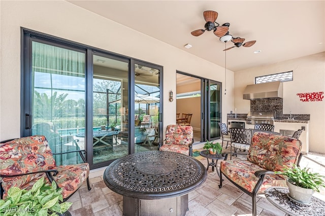 balcony featuring grilling area, a patio area, ceiling fan, and area for grilling