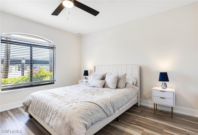 12181 Kelly Sands Way Unit 1538, Fort Myers, FL 33908 - bedroom featuring wood finished floors, baseboards, and ceiling fan