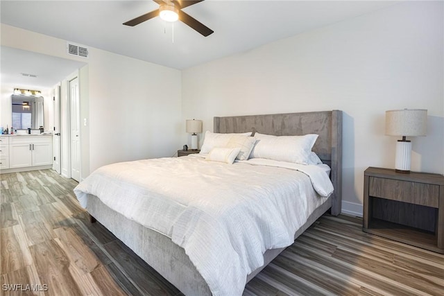 12181 Kelly Sands Way Unit 1538, Fort Myers, FL 33908 - bedroom featuring connected bathroom, a ceiling fan, light wood-type flooring, visible vents, and baseboards