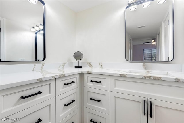 12181 Kelly Sands Way Unit 1538, Fort Myers, FL 33908 - bathroom featuring double vanity and visible vents
