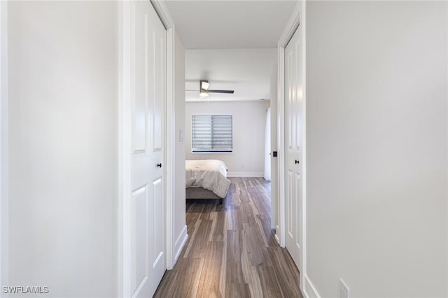 12181 Kelly Sands Way Unit 1538, Fort Myers, FL 33908 - hall featuring dark wood-style flooring and baseboards