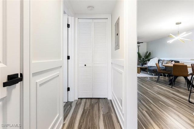 12181 Kelly Sands Way Unit 1538, Fort Myers, FL 33908 - hallway featuring electric panel and wood finished floors