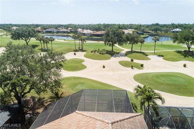 view of property's community featuring golf course view and a water view