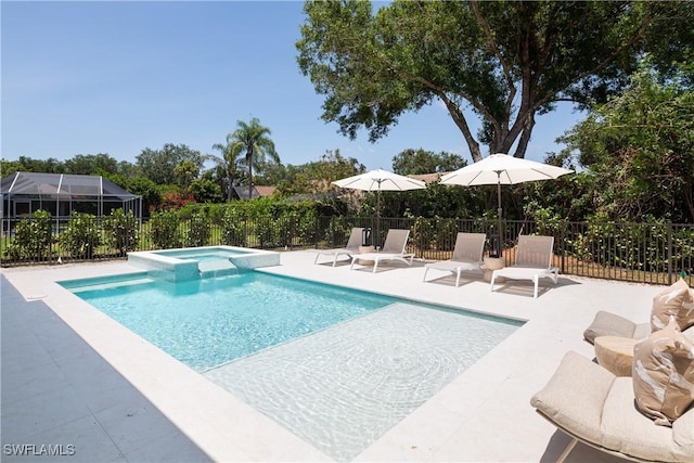 204 Monterey Dr, Naples, FL 34119 - view of pool featuring a patio and a pool with connected hot tub