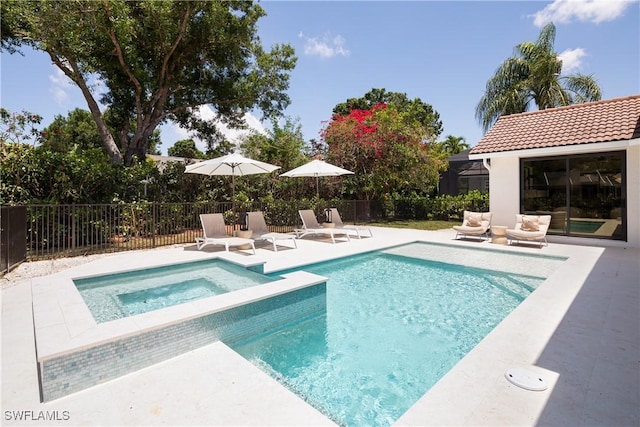 204 Monterey Dr, Naples, FL 34119 - view of swimming pool with an in-ground hot tub and a patio