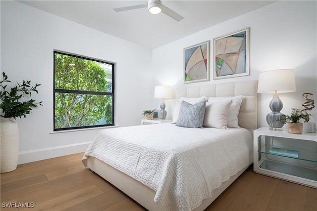204 Monterey Dr, Naples, FL 34119 - bedroom featuring wood finished floors, baseboards, and a ceiling fan