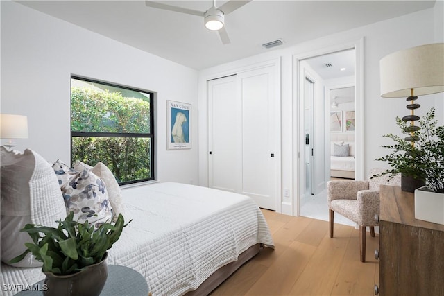 204 Monterey Dr, Naples, FL 34119 - bedroom with light wood-type flooring, ceiling fan, and a closet