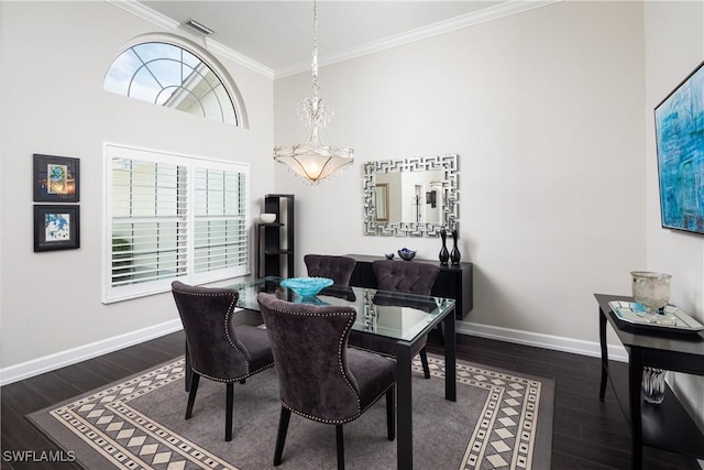 dining space with visible vents, ornamental molding, dark wood-style floors, and baseboards