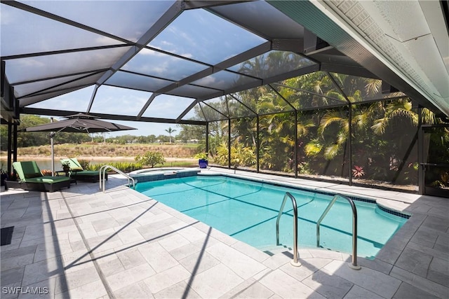view of pool with a lanai, a patio, and a pool with connected hot tub