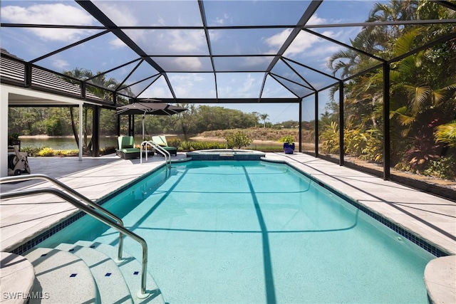view of swimming pool featuring a lanai, a patio, and a pool with connected hot tub