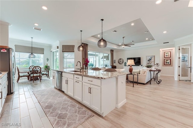 15951 Talon Ter, Punta Gorda, FL 33982 - kitchen with visible vents, recessed lighting, white cabinets, a sink, and appliances with stainless steel finishes