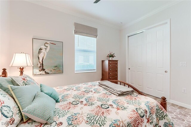 15951 Talon Ter, Punta Gorda, FL 33982 - bedroom featuring a closet, ornamental molding, baseboards, and ceiling fan
