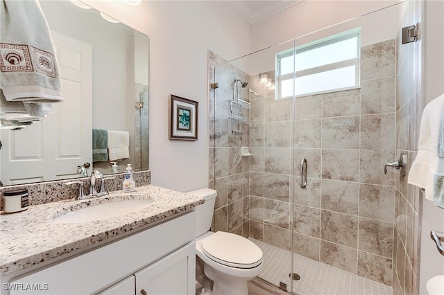 15951 Talon Ter, Punta Gorda, FL 33982 - full bath featuring vanity, toilet, ornamental molding, and a stall shower