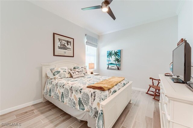 15951 Talon Ter, Punta Gorda, FL 33982 - bedroom with crown molding, wood tiled floor, baseboards, and a ceiling fan