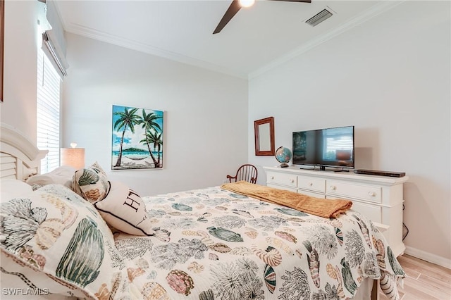 15951 Talon Ter, Punta Gorda, FL 33982 - bedroom with visible vents, crown molding, baseboards, ceiling fan, and light wood finished floors