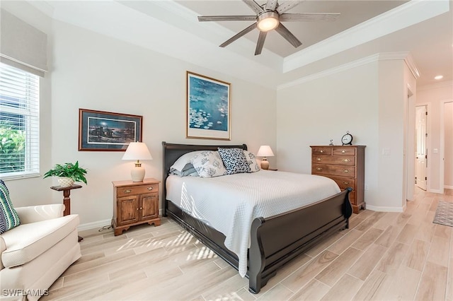 15951 Talon Ter, Punta Gorda, FL 33982 - bedroom with crown molding, ceiling fan, baseboards, light wood-type flooring, and a tray ceiling