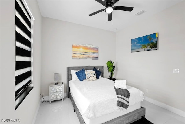 bedroom with baseboards and ceiling fan