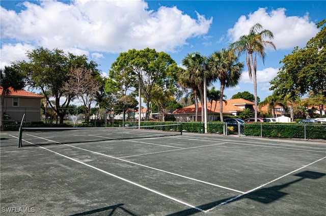 view of sport court with fence