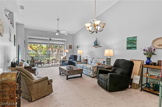 carpeted living area with high vaulted ceiling, visible vents, and ceiling fan with notable chandelier