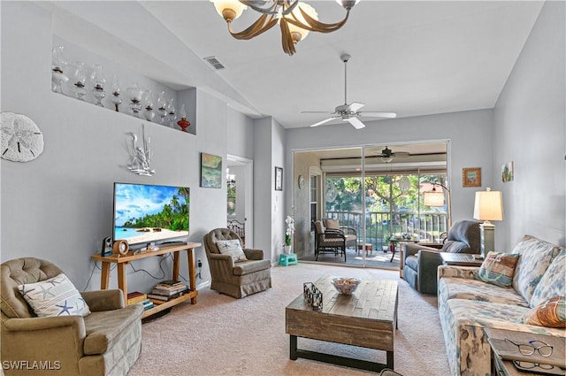living room with carpet floors, visible vents, and ceiling fan