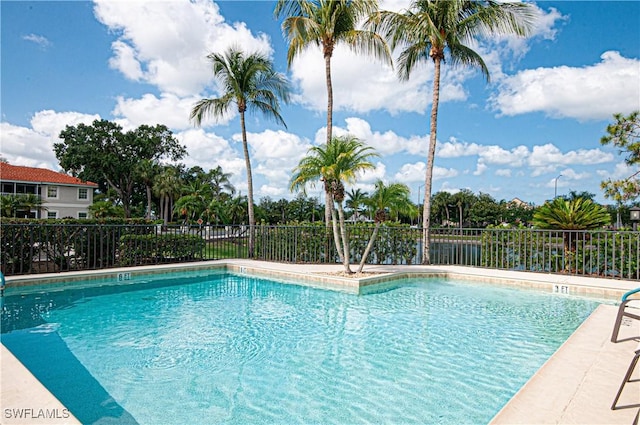 community pool with fence