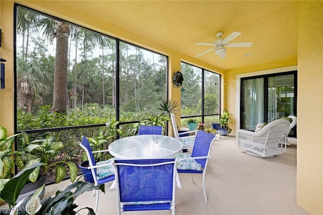 sunroom featuring carpet floors