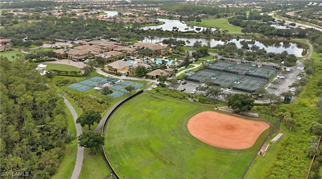 aerial overview of property's location featuring a large body of water and nearby suburban area