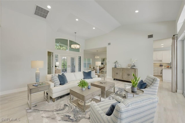 25011 Goldcrest Dr, Bonita Springs, FL 34134 - living area featuring high vaulted ceiling, visible vents, and recessed lighting