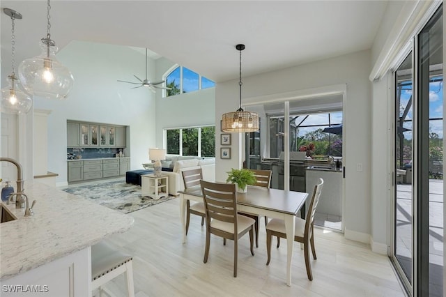 25011 Goldcrest Dr, Bonita Springs, FL 34134 - dining space with light wood-style floors and ceiling fan