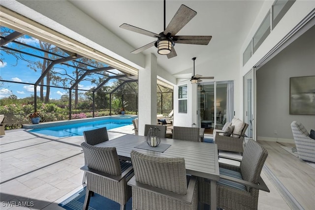 25011 Goldcrest Dr, Bonita Springs, FL 34134 - exterior space with a lanai, a ceiling fan, a pool with connected hot tub, and a patio