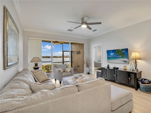 28436 Altessa Way Unit 102, Bonita Springs, FL 34135 - living area with crown molding, ceiling fan, light wood-style flooring, and visible vents
