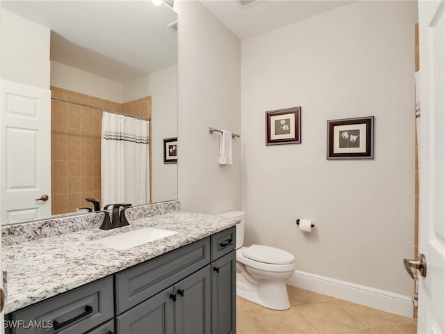 28436 Altessa Way Unit 102, Bonita Springs, FL 34135 - full bathroom with tile patterned flooring, vanity, toilet, baseboards, and curtained shower