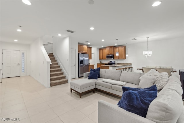 12109 Palm Cove St, Fort Myers, FL 33913 - living room with recessed lighting, stairway, visible vents, light tile patterned floors, and baseboards