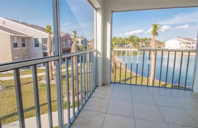 142 Santa Clara Dr Unit 7, Naples, FL 34104 - balcony featuring a water view and a residential view