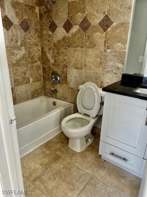 142 Santa Clara Dr Unit 7, Naples, FL 34104 - full bath featuring tile patterned floors, vanity, shower / tub combination, and toilet