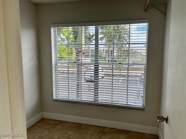 142 Santa Clara Dr Unit 7, Naples, FL 34104 - room details featuring baseboards