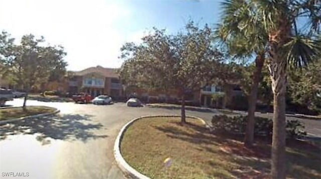 142 Santa Clara Dr Unit 7, Naples, FL 34104 - view of road featuring curbs