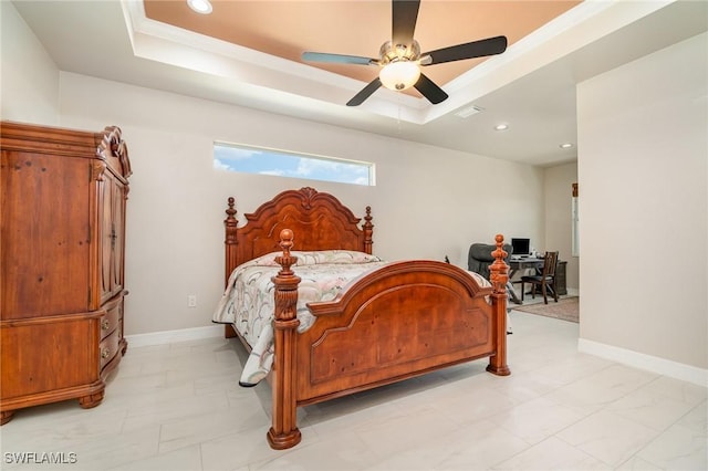 bedroom featuring baseboards, recessed lighting, marble finish floor, and a tray ceiling