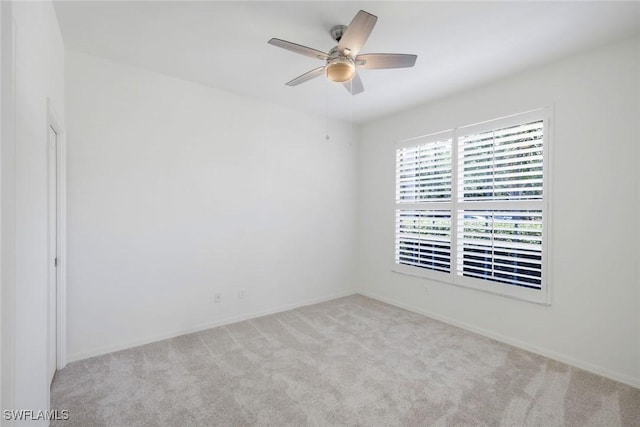 9040 Palmas Grandes Blvd Unit 101, Bonita Springs, FL 34135 - unfurnished room with carpet flooring, ceiling fan, and baseboards