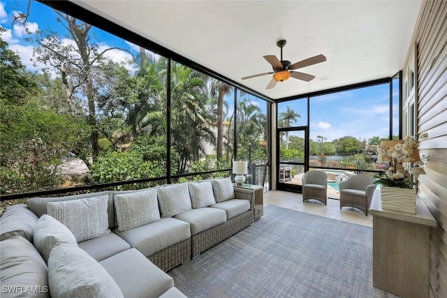 sunroom with a water view