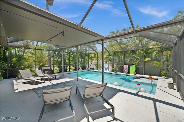 2017 Cape Coral Pkwy W, Cape Coral, FL 33914 - outdoor pool with glass enclosure and a patio