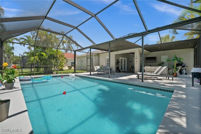 2017 Cape Coral Pkwy W, Cape Coral, FL 33914 - outdoor pool featuring a patio area, glass enclosure, and french doors