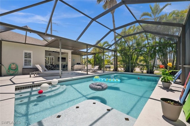2017 Cape Coral Pkwy W, Cape Coral, FL 33914 - swimming pool with a patio area, ceiling fan, and a lanai