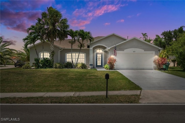 2017 Cape Coral Pkwy W, Cape Coral, FL 33914 - ranch-style home with stucco siding, a garage, a lawn, and driveway