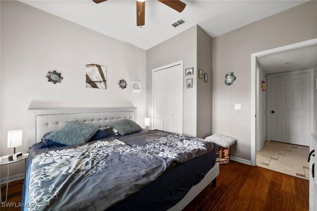 2017 Cape Coral Pkwy W, Cape Coral, FL 33914 - bedroom featuring wood finished floors, baseboards, a ceiling fan, and a closet