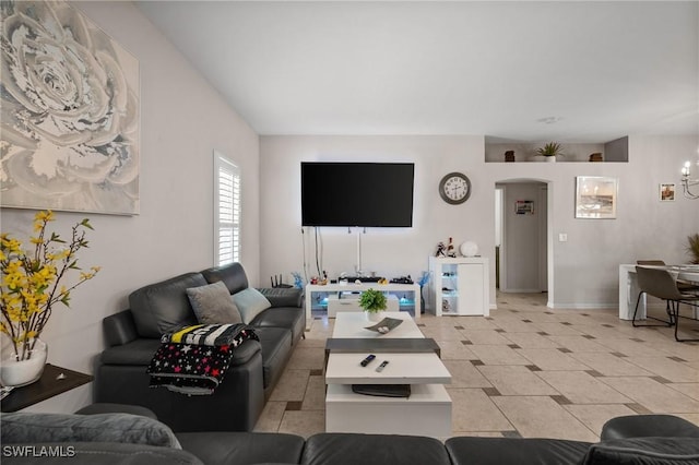 2017 Cape Coral Pkwy W, Cape Coral, FL 33914 - living room featuring arched walkways and baseboards